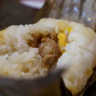 rice with sausage and hard egg yolk.