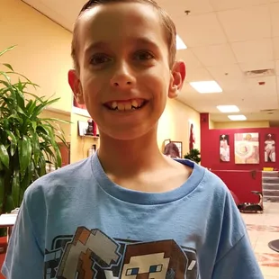 After his "trim" and his hair now has to be brush to the side like that because it will look lopsided if not