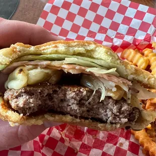 Blue Hawaii burger. There is a slice of pineapple between the burger patty and the cheese.