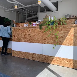 a woman standing at the counter