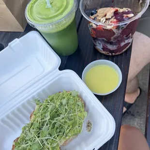 Avocado toast, açaí bowl, ginger shot, and green juice