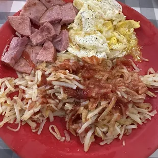 Ham, fried eggs, ketchup with some hash browns  (Forgot to take the picture first