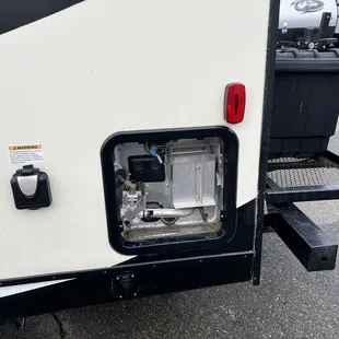 Missing door to water heater, discolored doors , decals removed and not replaced.