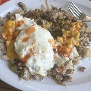 What's left of my 2 egg, ShoNuff patty with rice and veggies.