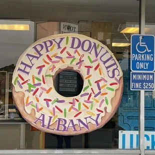 a large doughnut with sprinkles