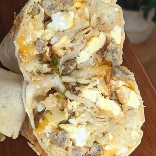 Amazing breakfast burrito, a must order. Pico de Gallo comes inside
