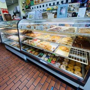 a display case filled with donuts