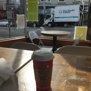 Coffee and bagel in the bag. Cozy down to earth place