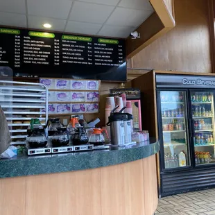 the front counter of a donut shop