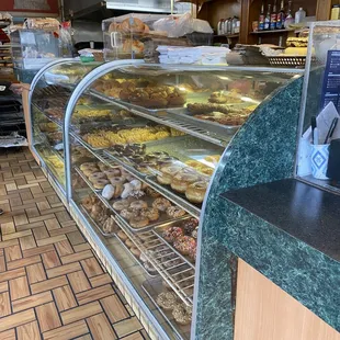 a display case filled with donuts