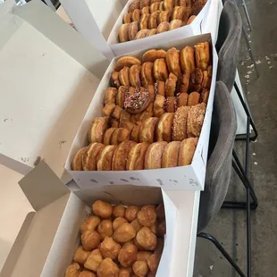 a variety of doughnuts in boxes