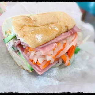 Vietnam Sandwich - inside view; it&apos;s ok, no pate inside, also the bread is more like a soft roll.