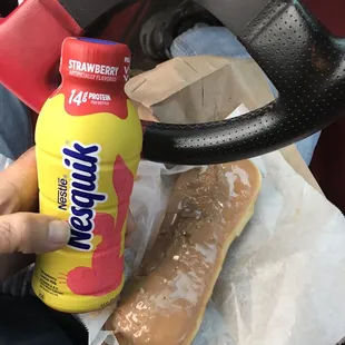 Custard filled maple bar and strawberry quick before a car show, breakfast of champions