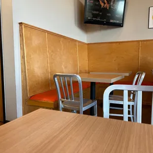 a table and chairs in a restaurant
