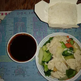 Steamed chicken and veggies (minus water chestnuts) with side of sauce and white rice
