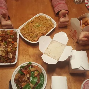 Top counterclockwise, chicken lo mein, kung pao chicken, beef with peapods, sweet and sour chicken.  Kids of Chris G with the thumbs up.