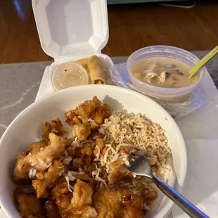 Orange chicken, egg rolls and coconut chicken soup