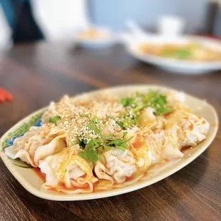 B20. Wontons in Red Chili Oil ($10.99)