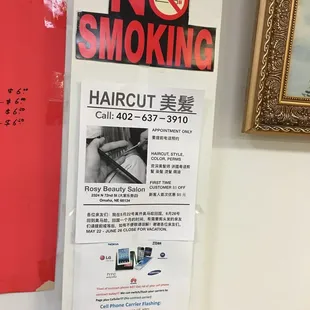 a no smoking sign on a wall