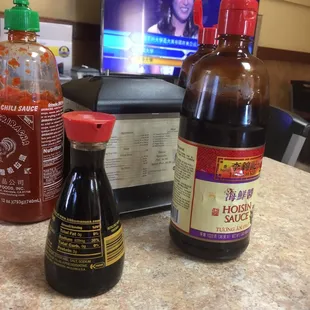 Hoisin, soy and siracha sauces.