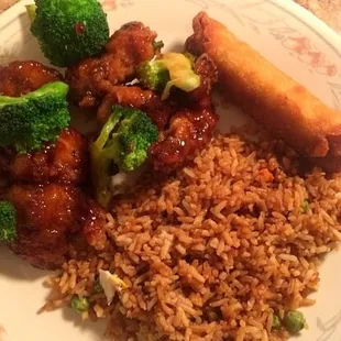 Fried rice, egg roll, and orange chicken