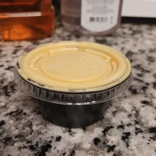 $4 for this little cup of extra huancaina sauce?