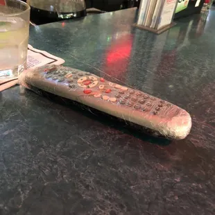 Plastic wrapped remote...