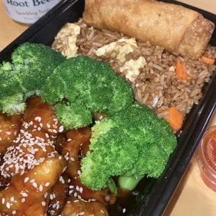 Sesame chicken lunch with fried rice and an eggroll