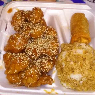 sesame chicken with fried rice and egg roll