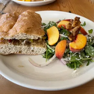 A summer peach and walnut salad - not exaggerating..maybe the best salad I&apos;ve had. A Cuban esque sandwich.