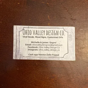 a business card on a table