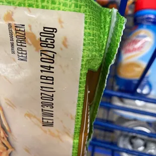 a grocery cart full of food