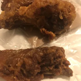 two pieces of fried chicken