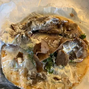 Gyro completely mucked up with tzatziki I requested be put in the side.