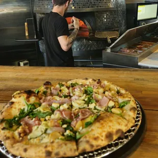 A pizza can be cooked in 90 seconds when the oven is 700°