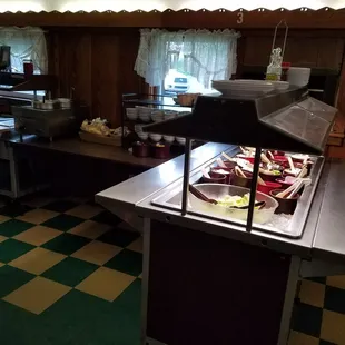 Salad bar, comes with many of the dishes and restocked frequently