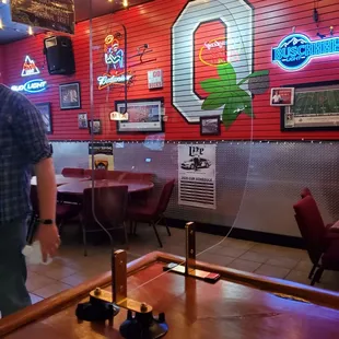 a man standing in a bar