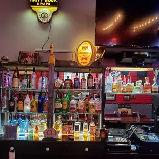 a bar with liquor bottles
