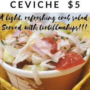 a bowl of salad with tortilla chips