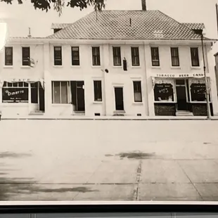 More recent historical photo of building restaurant/bar is in.