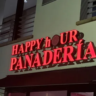 a neon sign for a restaurant