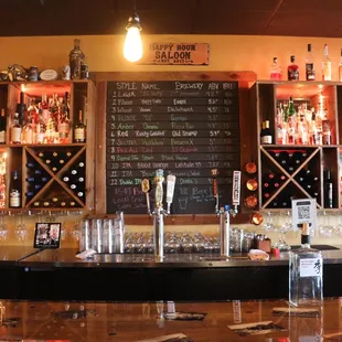 a bar with many bottles of alcohol