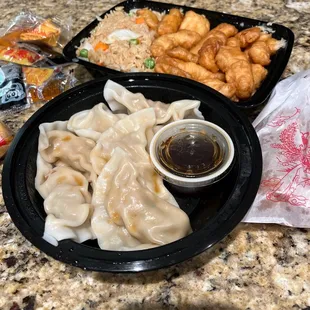 Sweet and sour chicken and steamed dumplings.  Yum!