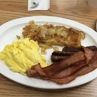 3 eggs, bacon and home fries with a side of sausage.