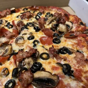 Happy Bay Bae Pizza - Red Sauce, Pepperoni, Sausage, and Mushroom. Add - Olives