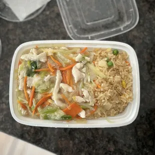 Chicken Chow Mein. $8.95 at lunch.  Comes with white or fried rice and your choice of soup (or a spring roll)