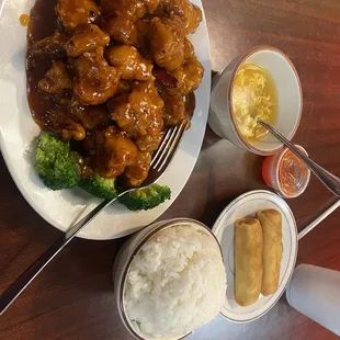 General Tso's chicken, egg drop soup, and spring rolls