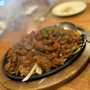 Black Pepper Beef in a sizzling hot plate