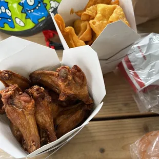 a variety of food items on a picnic table