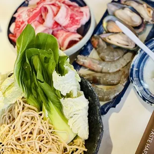 Shrimp, mussels, prime aged lamb, noodles, bokchoy
